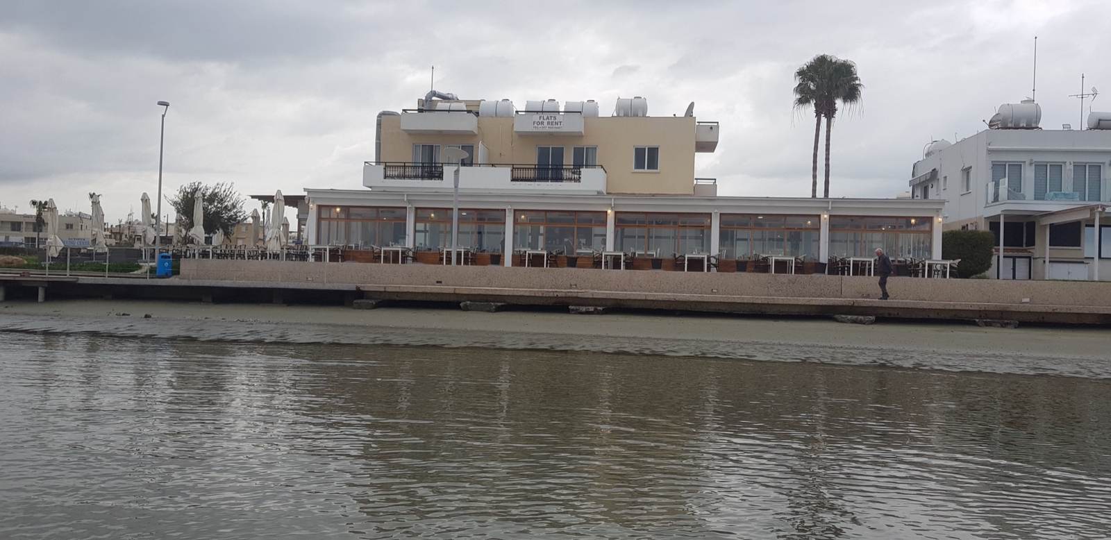 Mer Bleue Beach Restaurant on the Oroklini seafront, seen from the water