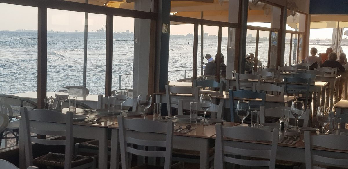 Set for dinner, sea in the window